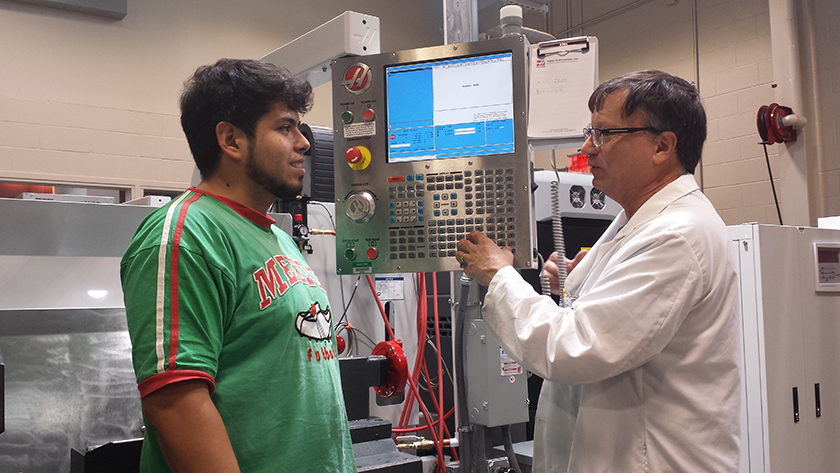 Guillermo Huerto with an HCC instructor