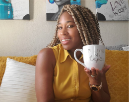 Photo of a female with a coffee cup in hand