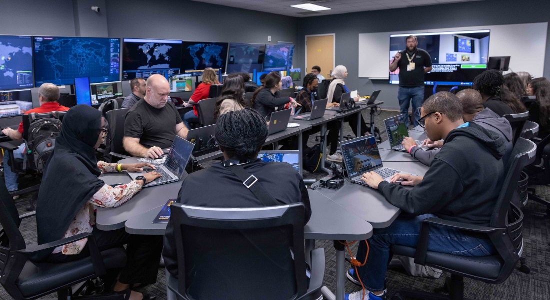 Students attend national AI symposium held at HCC last week.