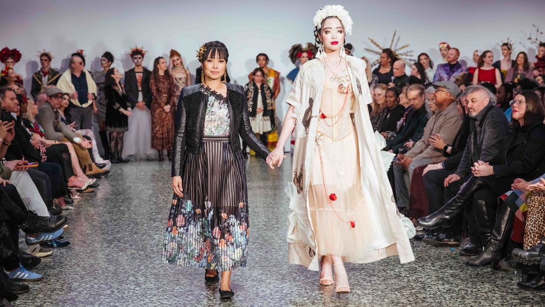 HCC Fashion Design alumna Kim Lai walks with her model wearing her winning design “Appearances” in the Reengineer: Repurpose the Forgotten category.