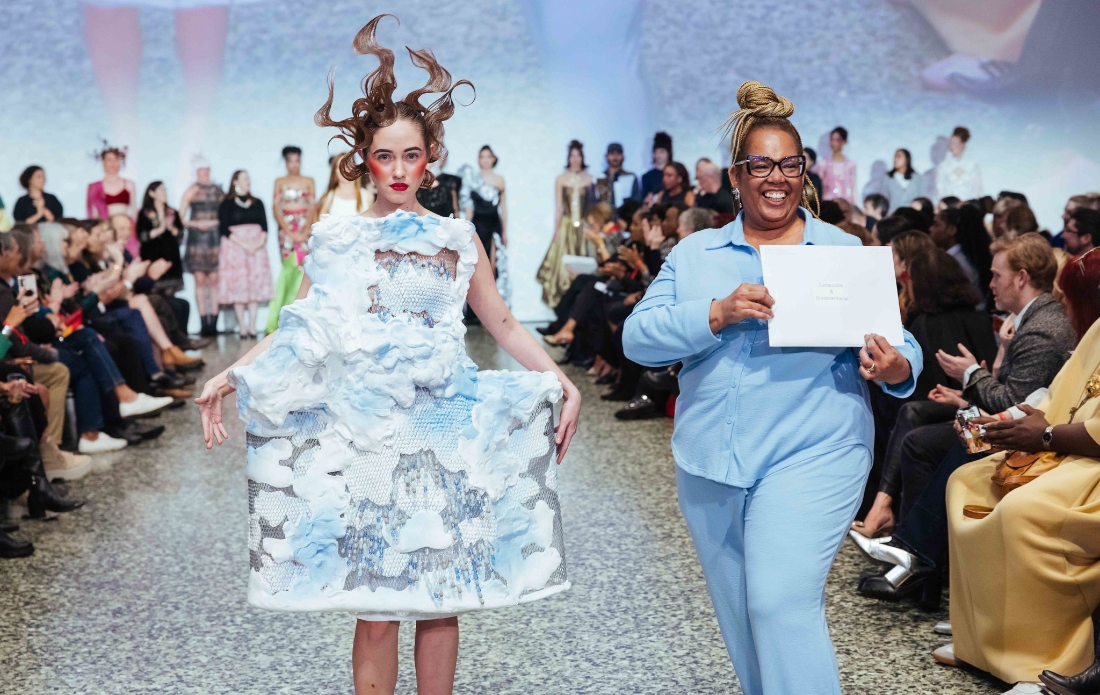 HCC Fashion Design student Kuteka Hill poses with the model wearing her garment Dragon Sky. Hill earned first place in the Sustainability & Unconventional category and Best of Show during the Fashion Fusion runway show hosted by the Museum of Fine Arts, Houston, held Jan. 30, 2025.