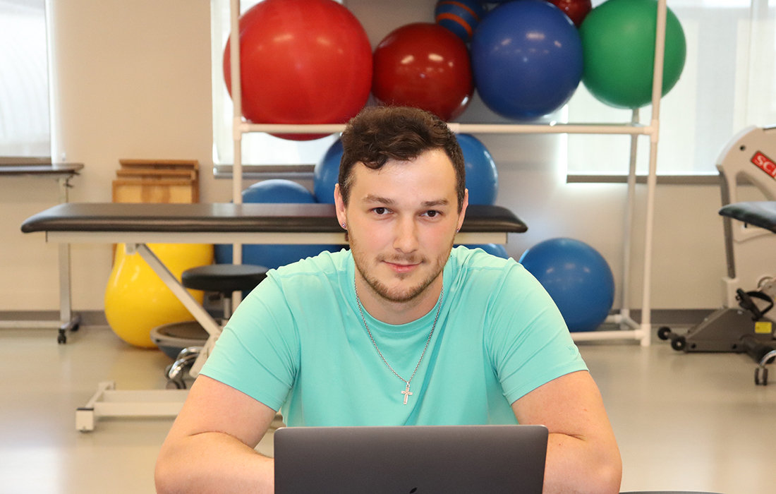 Bryan Easton studies for an exam in the Physical Therapy Assistant room.