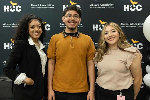 Smiling students at an event