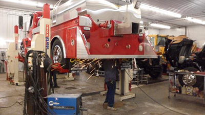 A picture of a Fire Truck being repaired